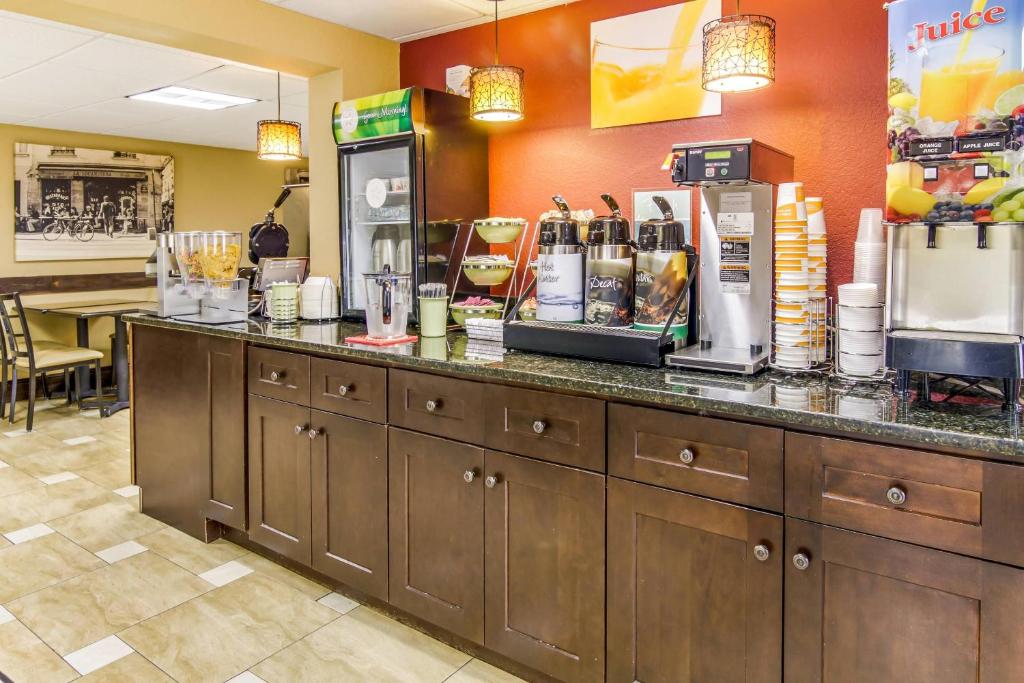 Quality Inn Stone Mountain FAQs – Complimentary breakfast area with waffle maker, coffee, and fresh items
